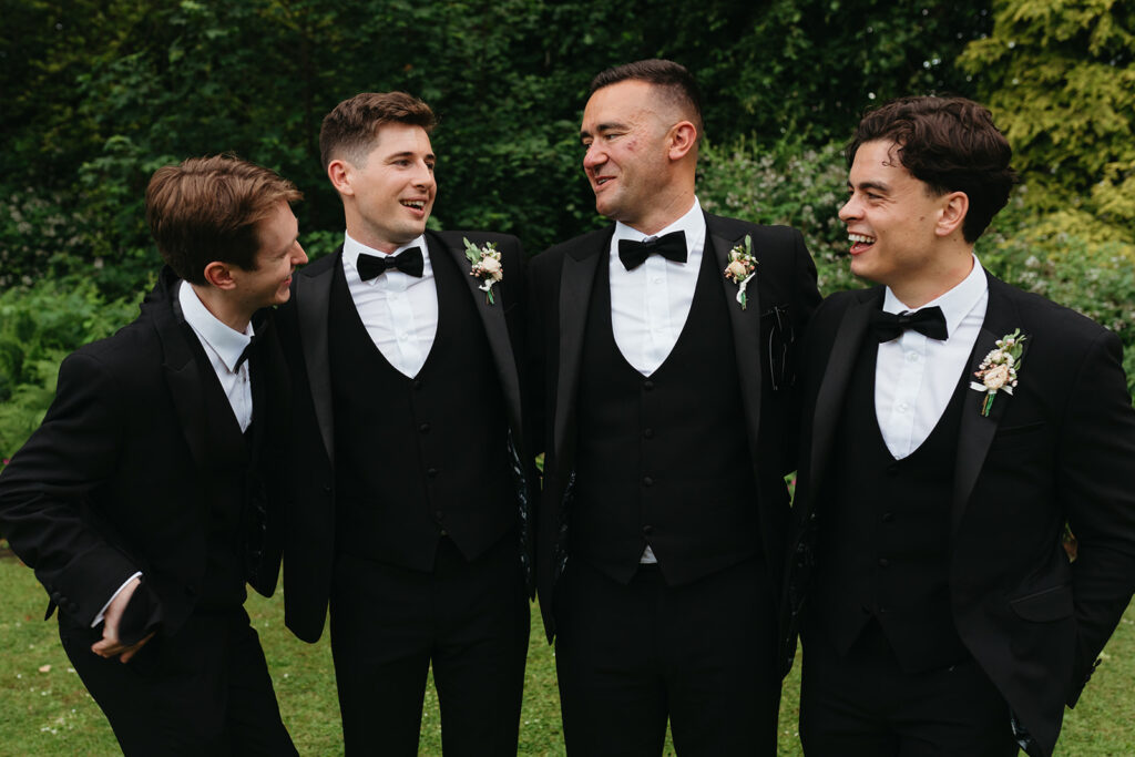 men in wedding tuxedos